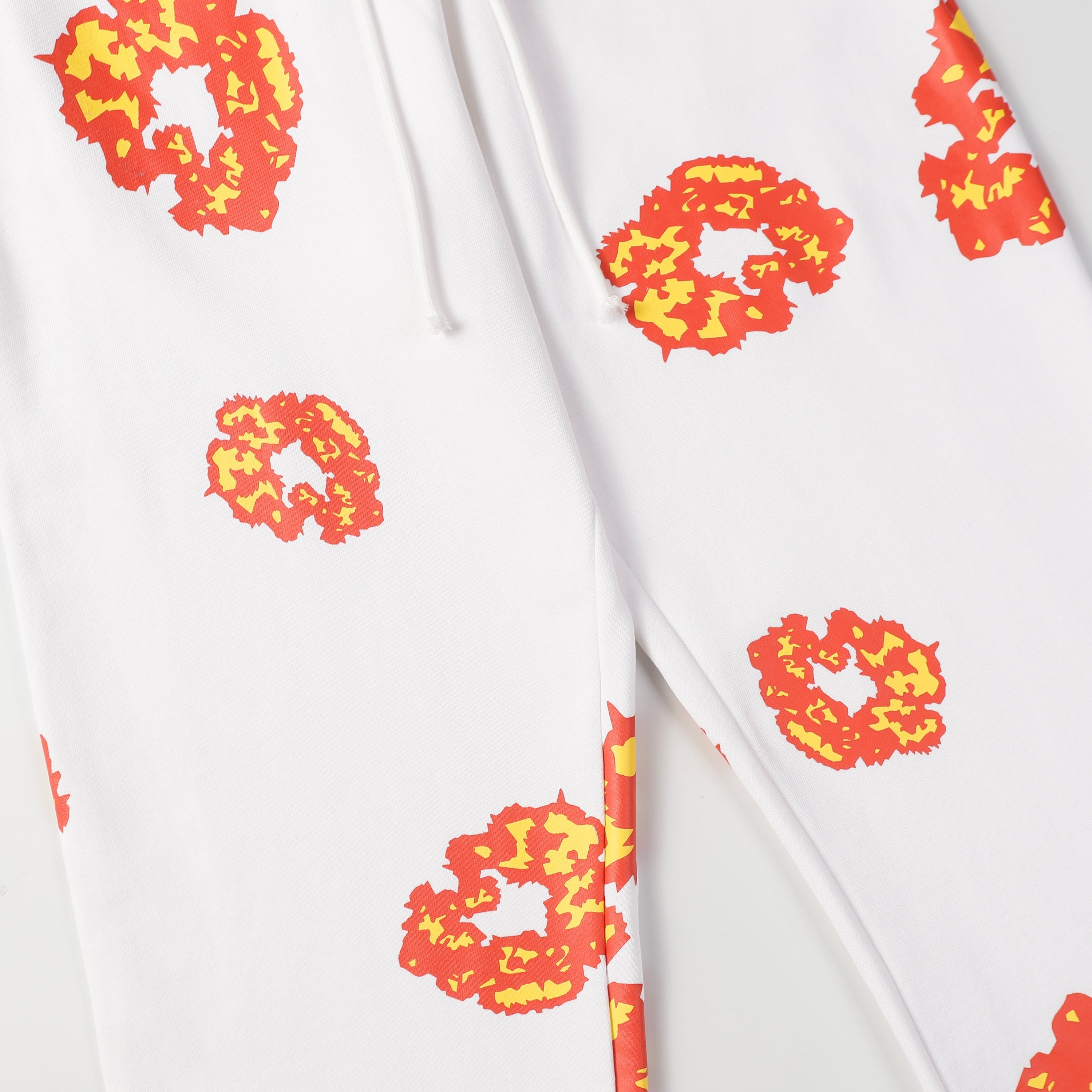 denim tears sweatpants ‘white-orange’
